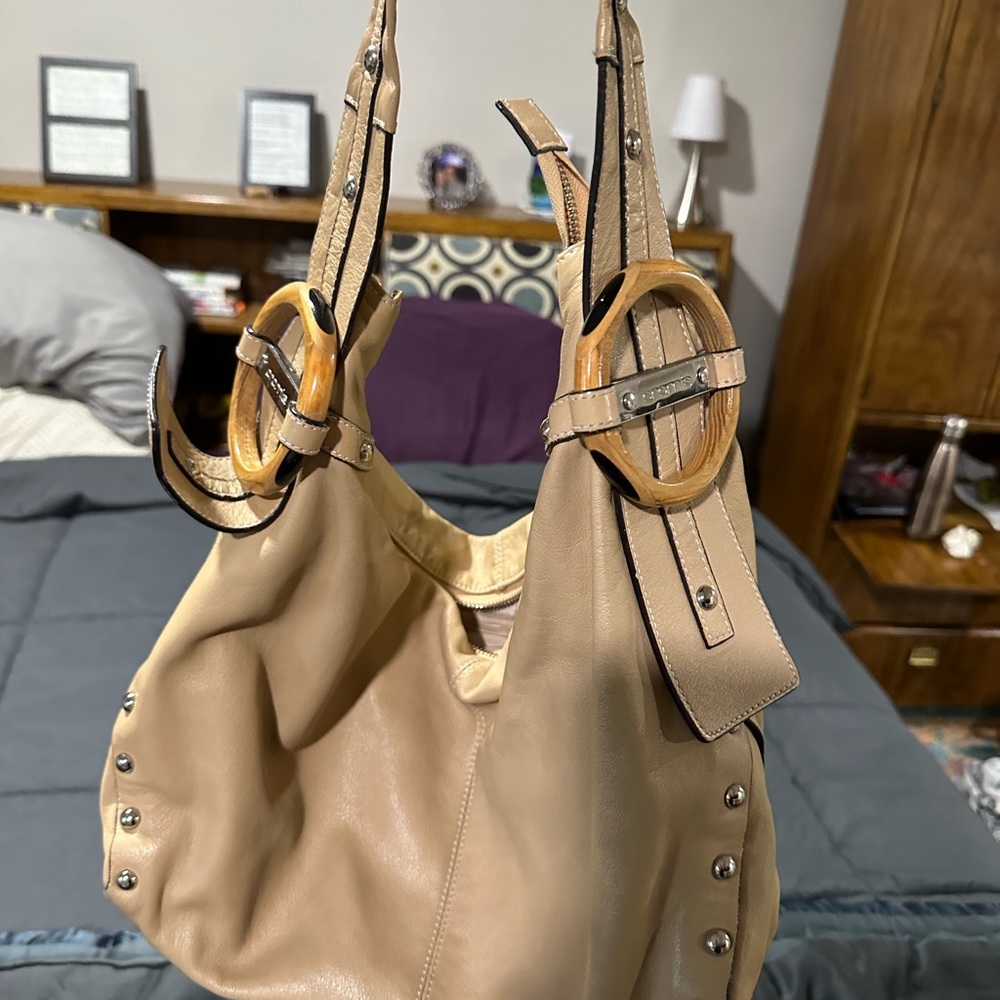 Tan/beige Cromia handbag. Some marks but good quality otherwise.